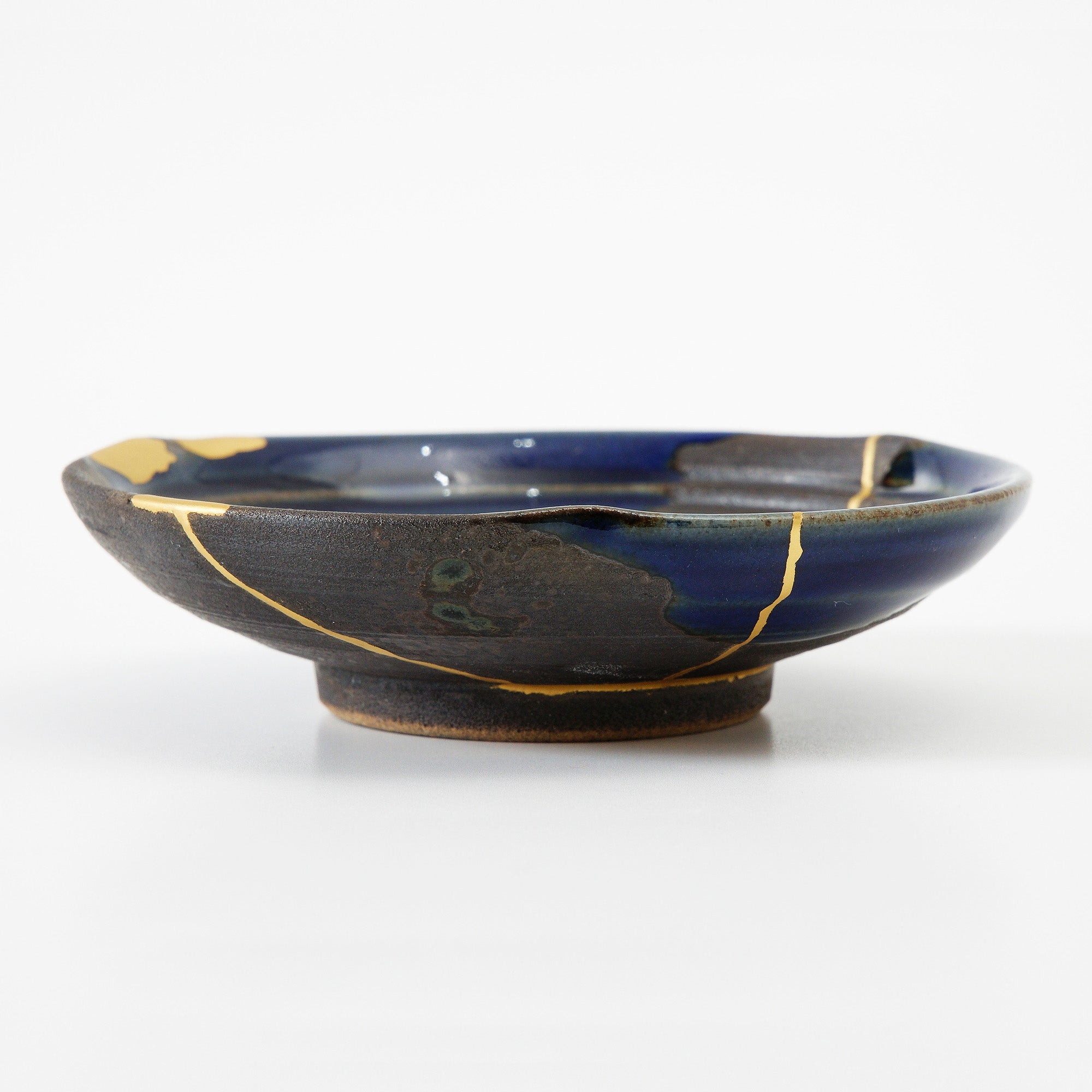 Small Japanese style bowl repaired outlet with traditional kintsugi method